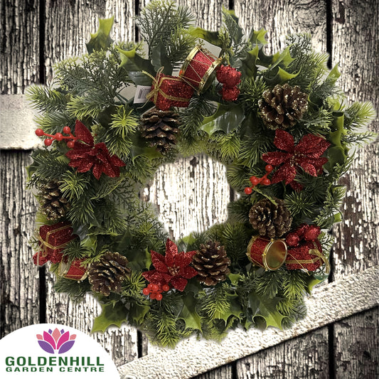 Christmas Wreath With Drums, Poinsettias and Cones. Red